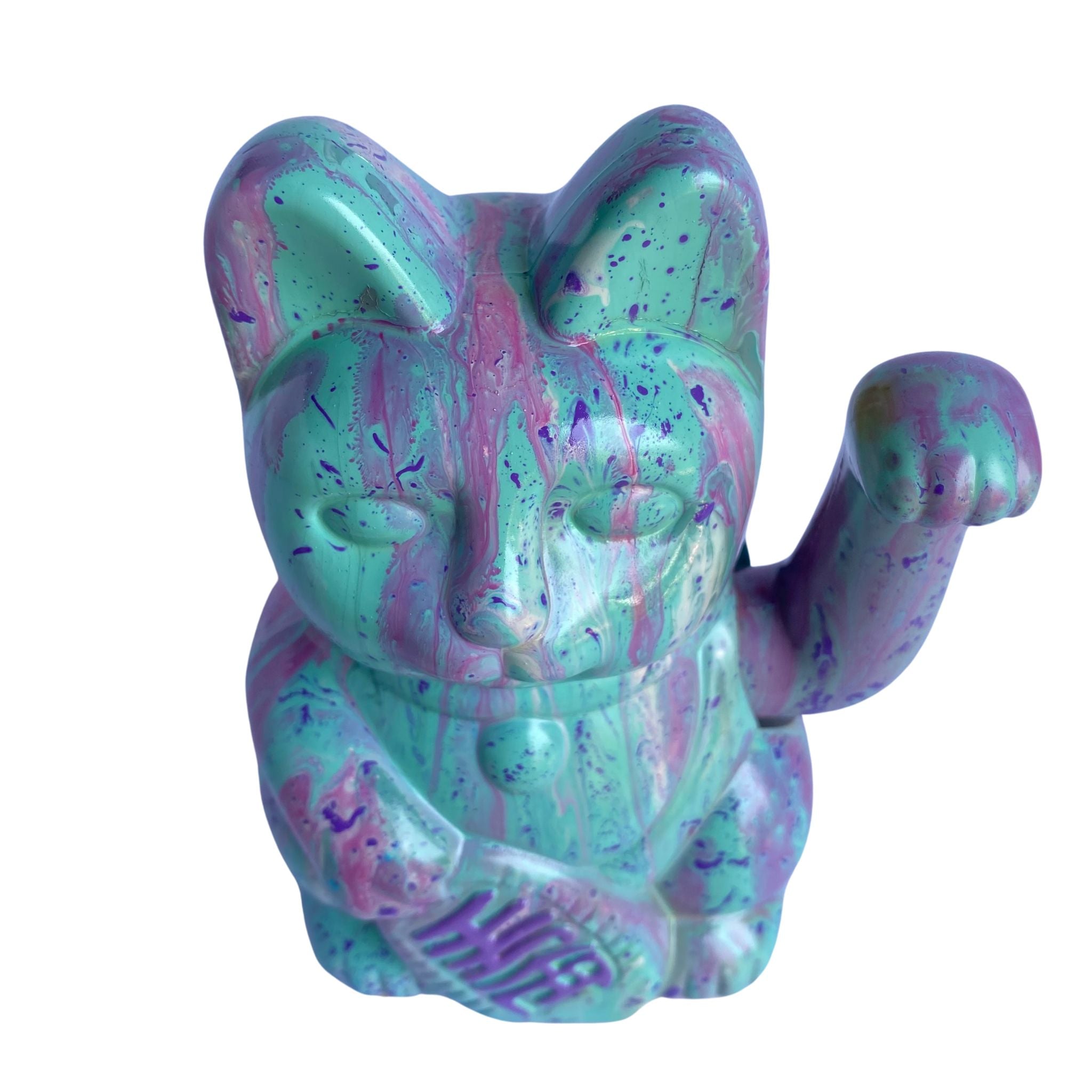 Colorful lucky cat figurine with a marbled pattern on a white background