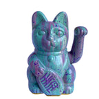 Colorful lucky cat figurine with a raised paw on a white background