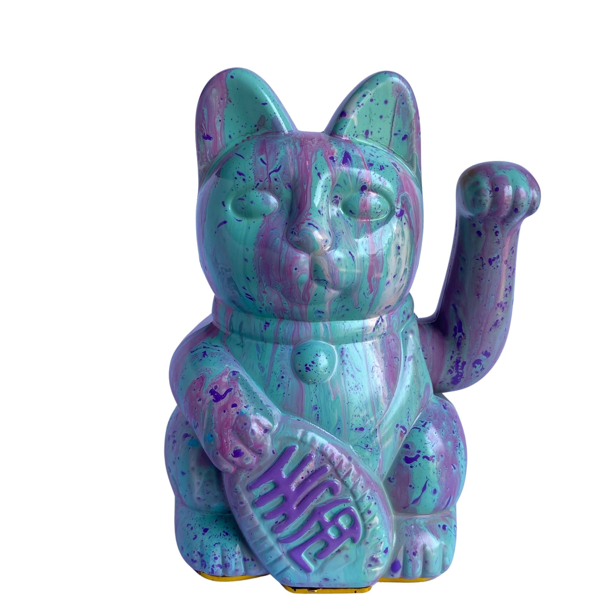Colorful lucky cat figurine with a raised paw on a white background