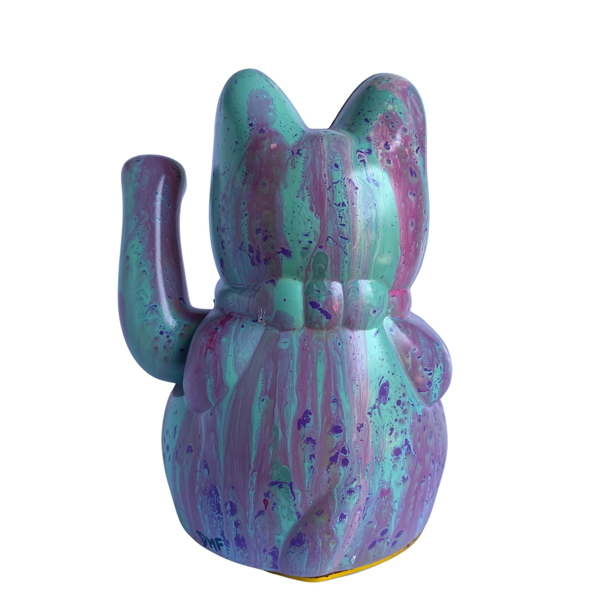 Colorful lucky cat-shaped figurine with a marbled pattern on a white background
